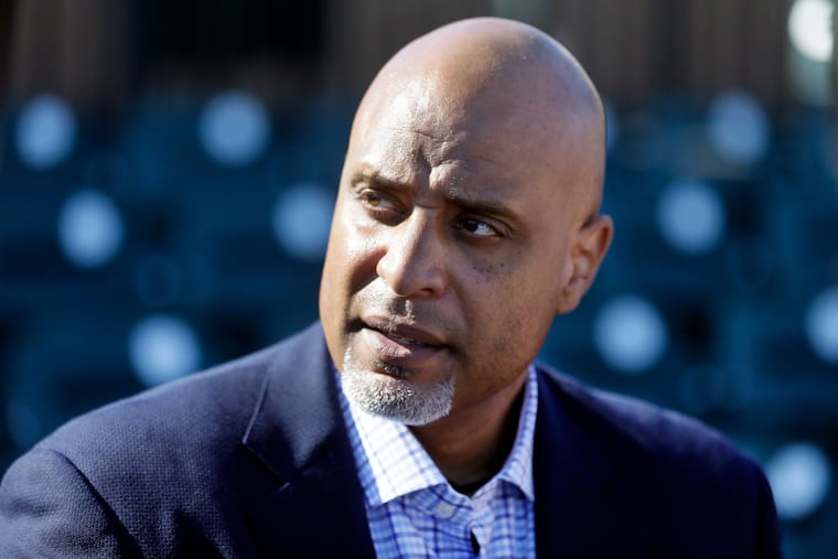 Major League Baseball Players Association executive Tony Clark talks to the media before a spring training game.