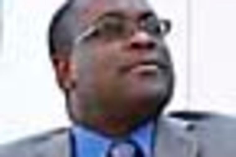 Kelvin Jeremiah, interim executive director of the Philadelphia Housing Authority, pictured at a new housing development on 11th and Norris streets in Philadelphia, Pa. on August 29, 2012. ( DAVID MAIALETTI / staff photographer )