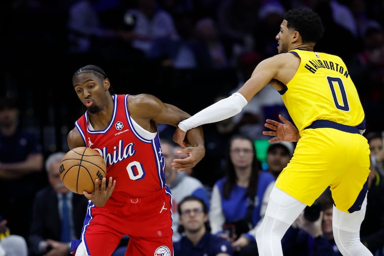 Sixers guard Tyrese Maxey steals the ball from Pacers guard Tyrese Haliburton during a game last season.