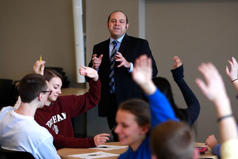Midatlantic Employers Association intructor Paul Daigle teaches professional tools to juniors at STEM in Downington, Tuesday, January 28, 2014. ( DAVID SWANSON / Staff Photographer )