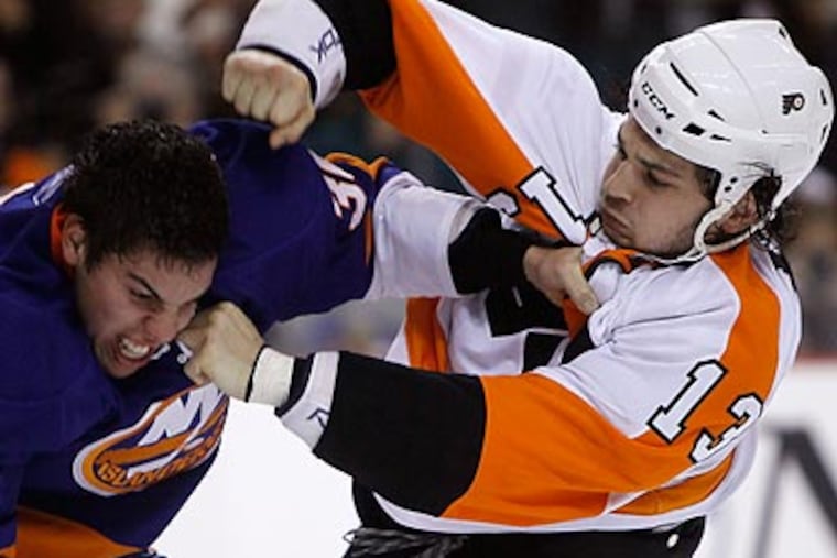 Dan Carcillo finds his role on the Flyers a bit uncertain with the team's offseason additions. (AP Photo/Matt Slocum)