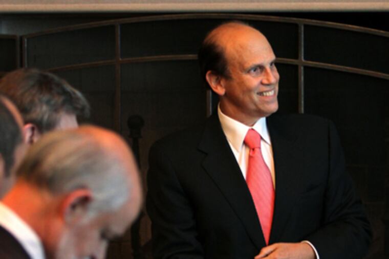 Michael Milken prepares to host a round-table talk at the Ace Country Club in Lafayette Hill at a fund-raiser for the Prostate Cancer Foundation. (Laurence Kesterson / Staff Photographer)