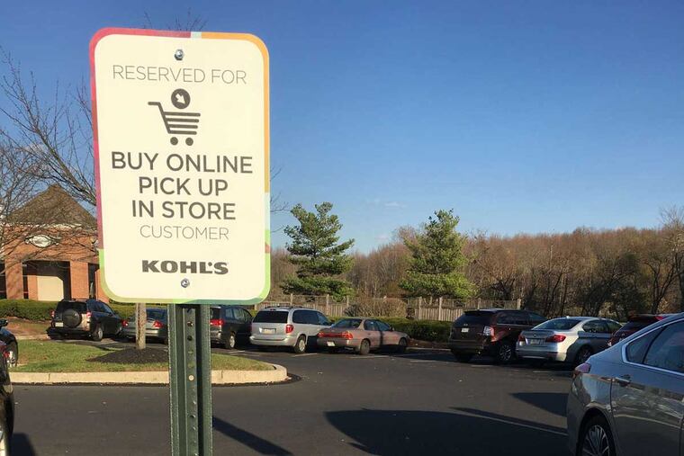 A Kohl’s parking lot has a spot reserved for customers who are just picking up online orders.