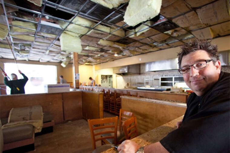 Angelo Lutz at the future home of his restaurant, the Kitchen Consigliere Cafe, in Collingswood. (David M Warren / Staff Photographer)