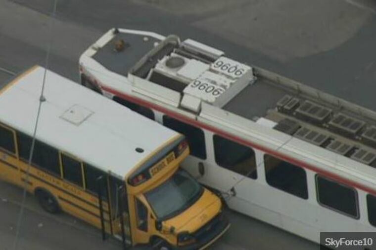 A school bus and trolley collided on Woodland Avenue, between 56th and 57th Streets in Southwest Philadelphia, Wednesday morning, Nov. 1, 2017. No children were on the bus.