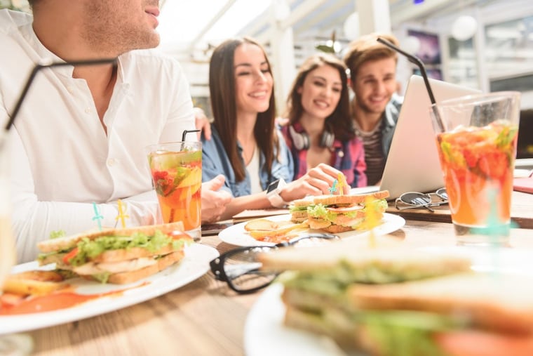 College friends at a coffee shop.