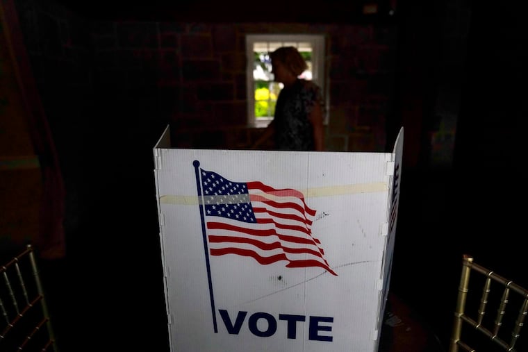 A person waiting in line to vote in the Georgia's primary election on May 24 in Atlanta.