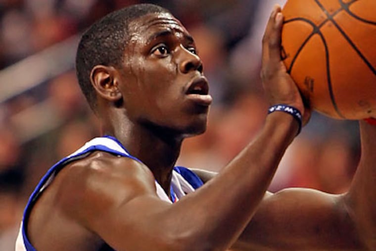 76ers coach Doug Collins has said Jrue Holiday (above) can become an elite point guard. (Steven M. Falk/Staff file photo)