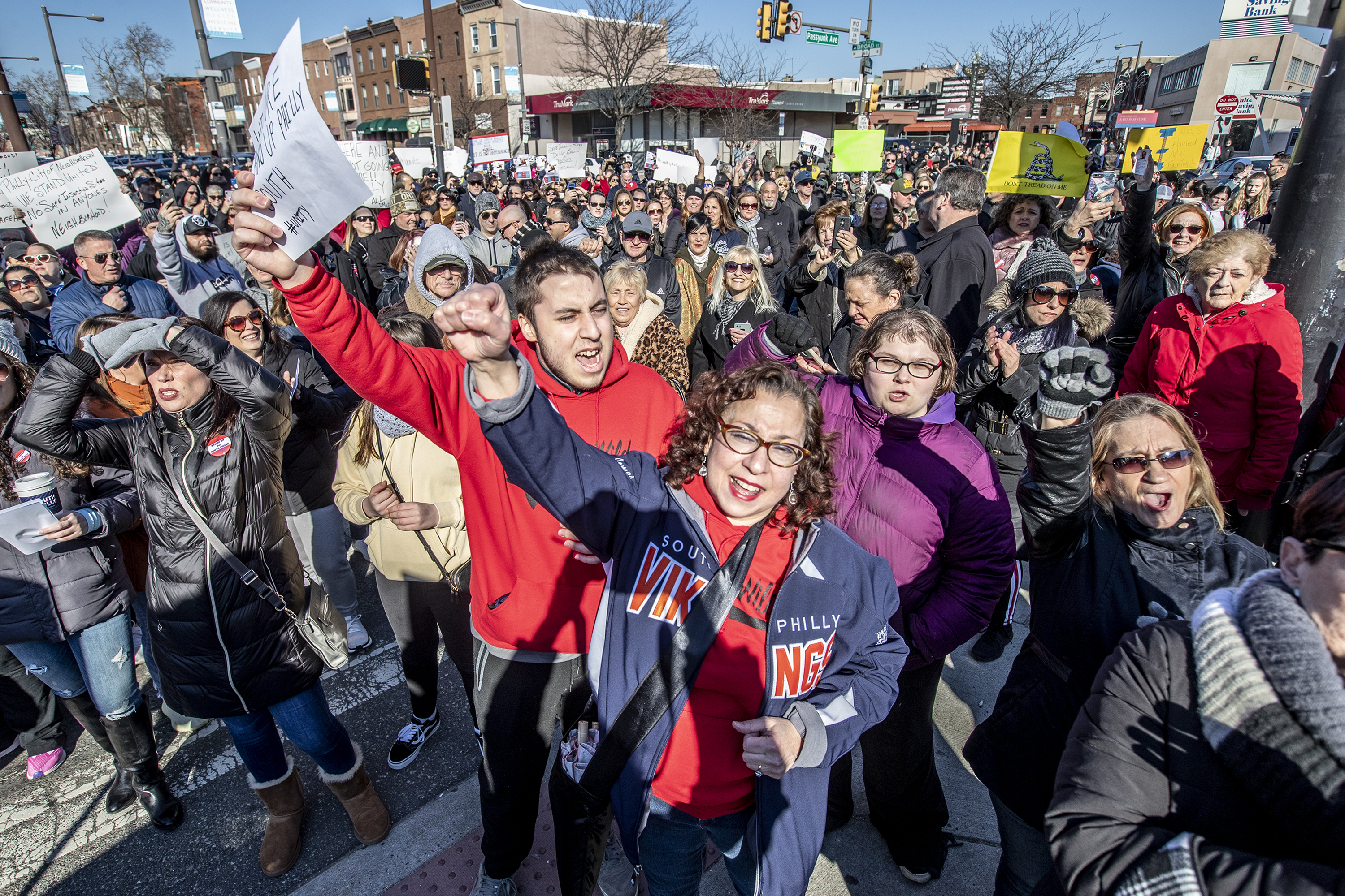 Maureen Fratantoni (center), a South Philadelphia resident, loudly protests, along with the rest of the crowd, the proposed supervised injection site on South Broad Street on Sunday.