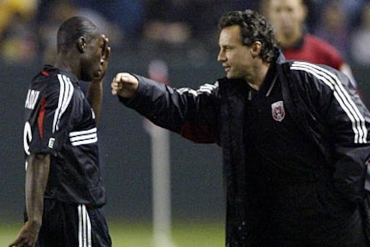 22-year old Freddy Adu got his first taste of professional soccer with Peter Nowak in 2004. (Nick Ut/AP)
