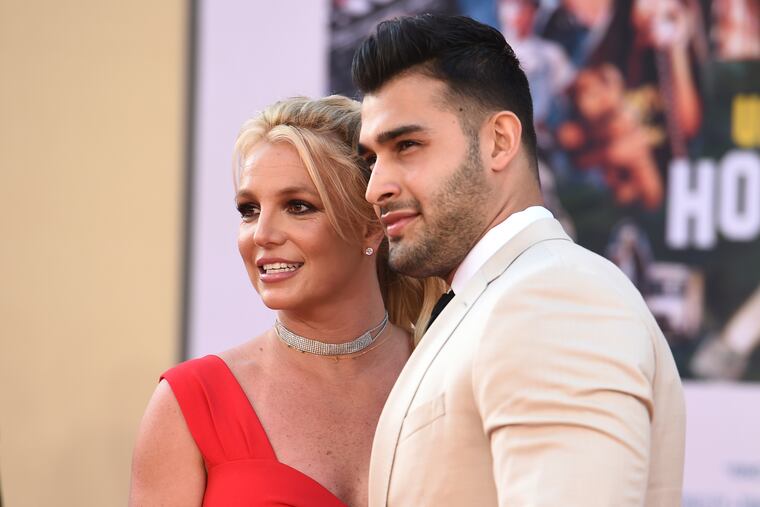 Britney Spears and Sam Asghari arrive at the Los Angeles premiere of "Once Upon a Time in Hollywood," at the TCL Chinese Theatre, Monday, July 22, 2019. Spears announced on Instagram on Sunday, Sept. 12, 2021, that she and Asghari are engaged. The couple met on the set of her “Slumber Party” music video in 2016. (Photo by Jordan Strauss/Invision/AP, File)