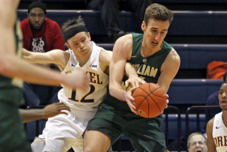 William and Mary's Jack Whitman, right and Drexel's Kari Jonsson (12) fight for a rebound in the first half of a college basketball game, Thursday, Feb. 9, 2017, in Philadelphia, Pa. ( H. Rumph Jr / For the Inquirer )