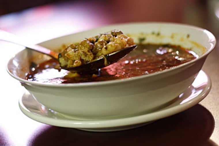 One tasty trio: The guacamole platter, left, eschews the typical blandness for rustic zest; flan, center, is a cool, creamy caramel; and the special Sunday pozole is a dish worth the trip. (ERIC MENCHER / Staff Photographer)