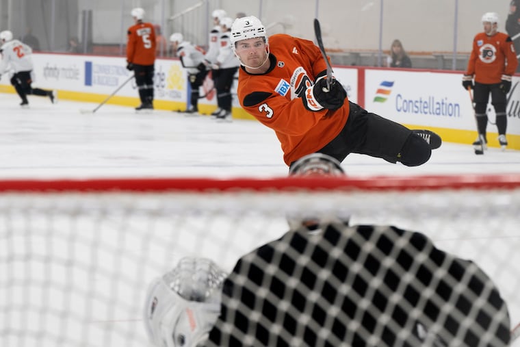 Flyers defenseman Helge Grans shoots on goal during training camp at the Flyers Training Center on Thursday.