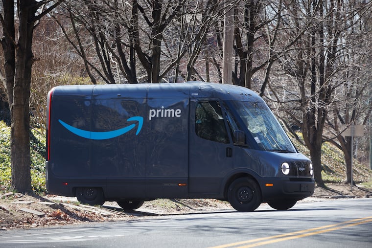 An Amazon truck drives on Midvale Avenue near Henry Avenue in the East Falls section of Philadelphia on Friday, March 1, 2024.