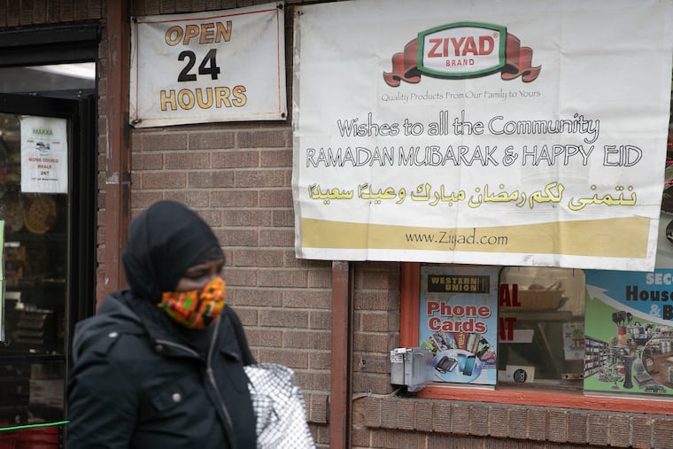 A sign wishing the community a Ramadan Mubarak hangs outside of Makkah Market in West Philadelphia on Tuesday, April 21, 2020. Muslims across the region and world will observe the holy month of Ramadan, which begins on Thursday evening, April 23, 2020.