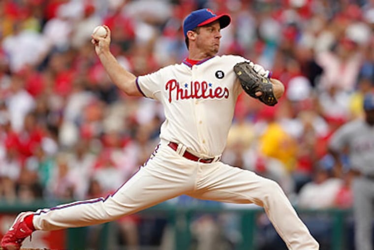 Roy Oswalt's record after yesterday's more-than-solid effort against the Cubs is a hard-luck 4-4. (Ron Cortes/Staff file photo)