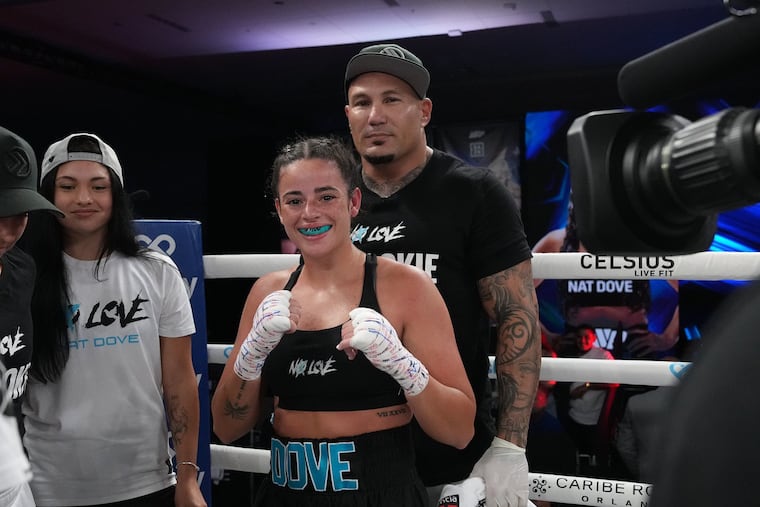 Natalie Dove, 23, here with one of her trainers, DJ Walton, is preparing for her second fight with Jake Paul's Most Valuable Promotions.