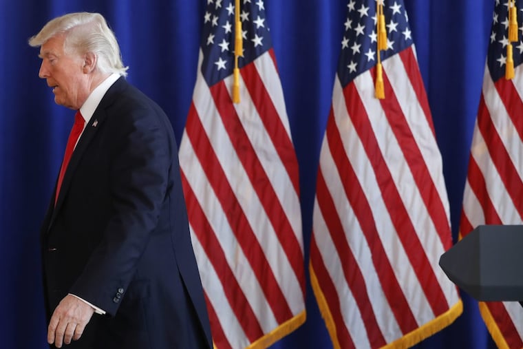 President Trump leaves after delivering a statement on the violence in Charlottesville, Va., on Saturday.