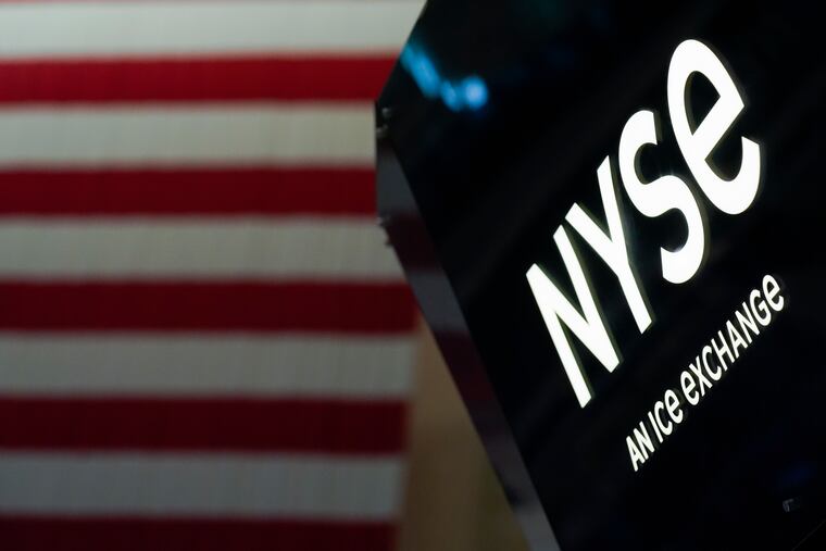 An NYSE sign is seen on the floor at the New York Stock Exchange in New York in June.,
