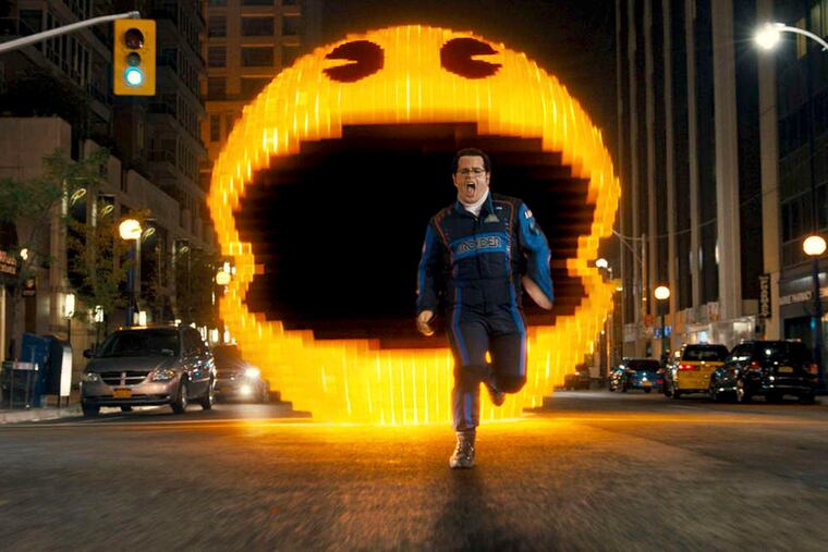Josh Gad, as Ludlow, chased by Pac-Man in "Pixels." Gad is a standout in the fantasy about a world faced with an invasion by 1980s video-game characters.
