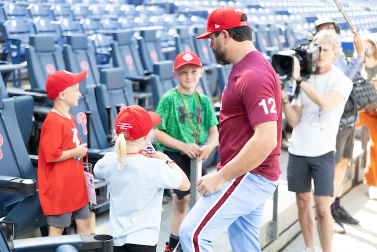 Kyle Schwarber meets with the Yeager family at Citizens Bank Park.