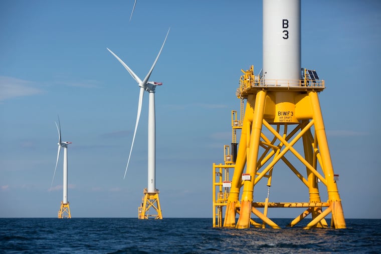 FILE - Three of Deepwater Wind's five turbines stand in the water, Aug. 15, 2016, off Block Island, R.I.