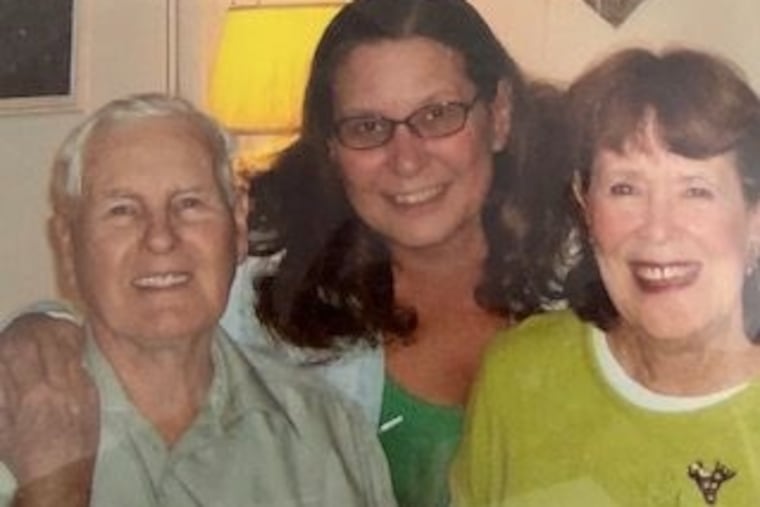 Mr. Campbell, with daughter Mary (center) and wife Carolyn, raised his family in Northeast Philly.