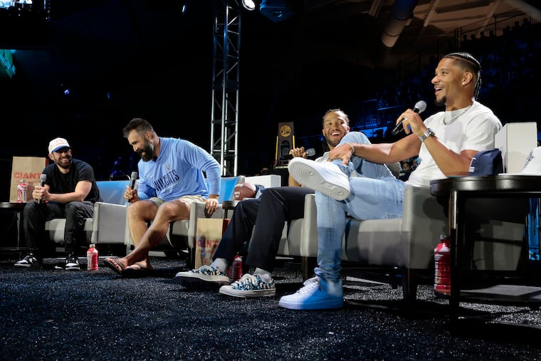 From left, Matt Hillman, Jason Kelce, Jalen Brunson, and Josh Hart laugh during the "Roommates" podcast inside Finneran Pavilion at Villanova on Wednesday.