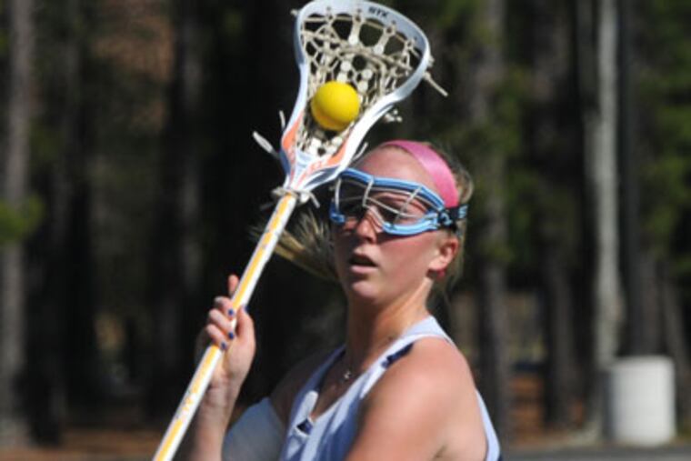 Shawnee HS lacrosse player Nicole Troost at a practice on March 19, 2012. (April Saul / Staff Photographer)