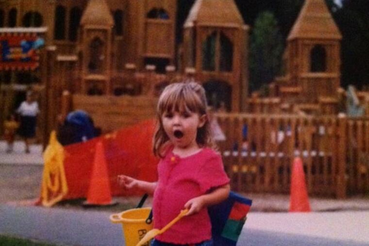 Ashlyn Byers was 2 when Kids' Castle opened in June 1997. Her parents co-chaired the committee that organized the more than 3,000 parents and children who designed and built the playground. Slug: scastle01