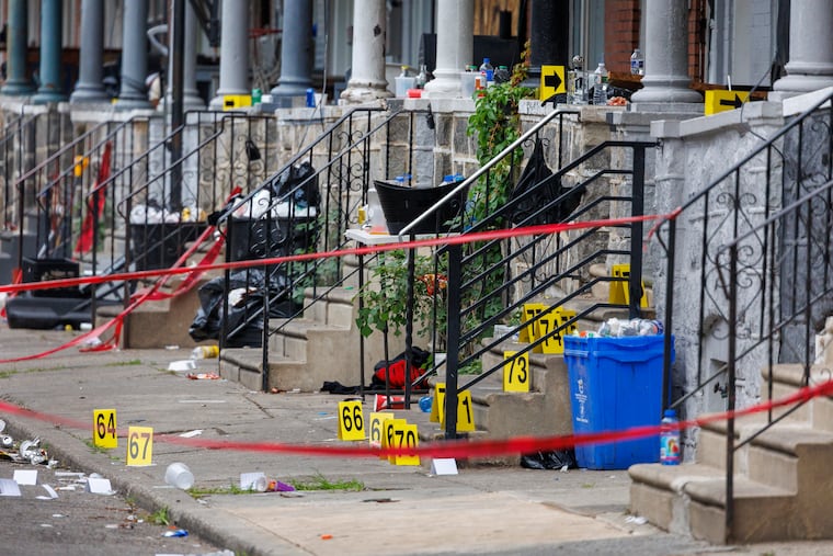 Crime scene markers at the scene of an overnight shooting on the 1500 block South Etting Street,