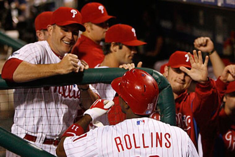 Jimmy Rollins helped the Phillies beat the Marlins in yesterday's nightcap, 7-4. (Michael S. Wirtz/Staff Photographer)