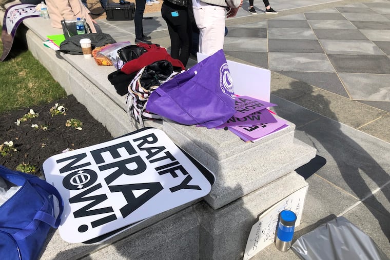 Advocates for the Equal Rights Amendment hold a rally on the Virginia Capitol steps in Richmond, Va., in 2019.