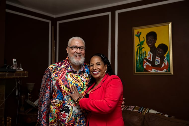 Bilal Qayyum and his wife Tamara Phoenix Qayyum pose for a portrait at their home in Philadelphia. The pair has been married for 36 years.