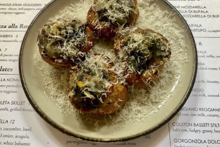 Angus steak gougeres (cheesesteak-topped puff pastries) at Alimentari, upstairs from Di Bruno Bros. at 1730 Chestnut St.