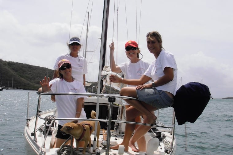 Former Philly reporter Margie Smith Holt (second from right, in red hat) with the St. John women who taught her to sail.