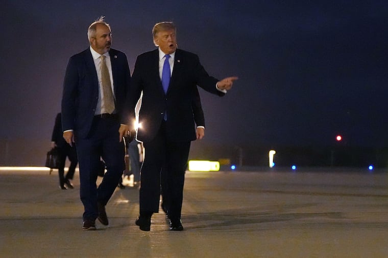 President Donald Trump walks to board Air Force One, Tuesday, Aug. 4, 2026, at Los Angeles International Airport in Los Angeles.