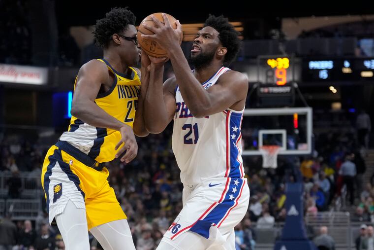 Joel Embiid (right) finished with 31 points on 10-of-15 shooting.