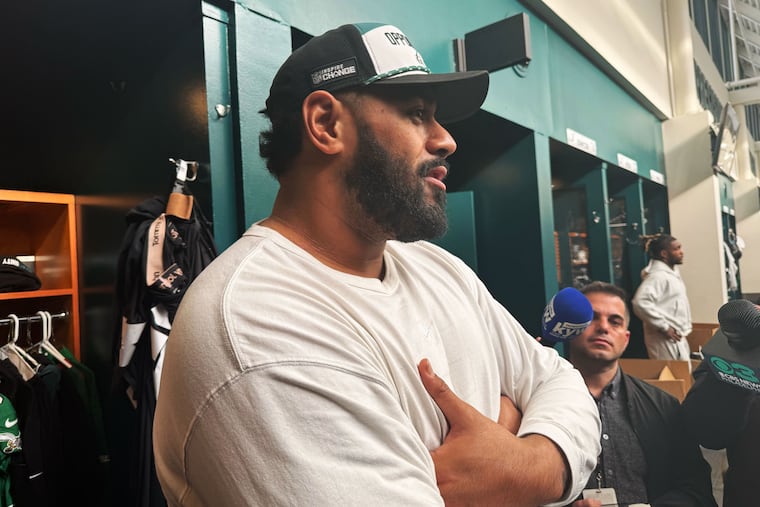 Eagles offensive lineman Jordan Mailata speaks to reporters as he empties his locker at the NovaCare Complex Monday.