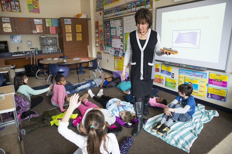 Cindy Goldberg, a mindfulness and positive psychology coach, leads a third- grade class in mindfulness training, at Glenside Elementary, in Glenside, PA, Tuesday, Feb. 6, 2018. JESSICA GRIFFIN / Staff Photographer.