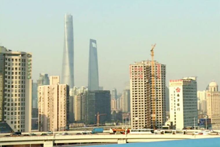 Air pollution haze in Shanghai, where new-age capitalism fights for coexistence with old-line communism.