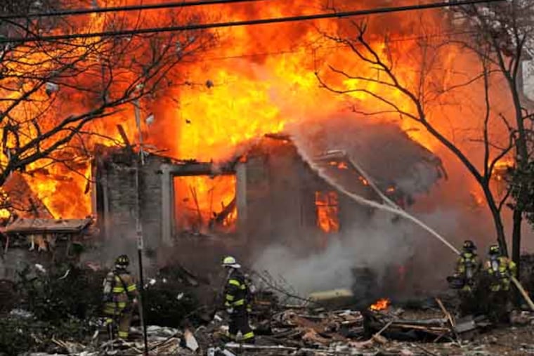 In Haddon Heights, NJ, a fire on the corner of the White Horse Pike and Green Street on Feb. 23, 2013. ( APRIL SAUL / Staff Photographer )