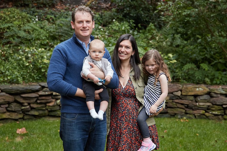 Eric and Dana with daughters Lily (left) and Maya.