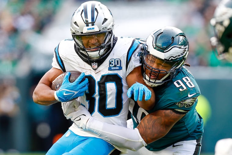 Eagles defensive tackle Jalen Carter, dropping Carolina's Chuba Hubbard for a loss, is a first-time Pro Bowler.