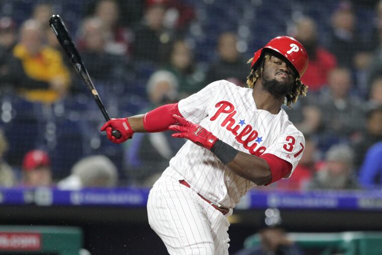 Center fielder Odubel Herrera was removed from the Phillies' 40-man roster on Tuesday.