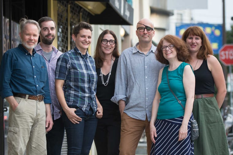 BRICKBAT18.(From left) Allen Crawford, John Pettit, Nikki Karam, Allitia DiBernardo, owner Patrick Richardson Graham, Laura Baird, and Noelle Egan stand in front of South Philadelphia's Brickbat Books on Thursday, Aug. 17, 2017. The store might have closed if not for the group of volunteers who stepped in when Graham was diagnosed with cancer. .(TRACIE VAN AUKEN/ For the Inquirer)