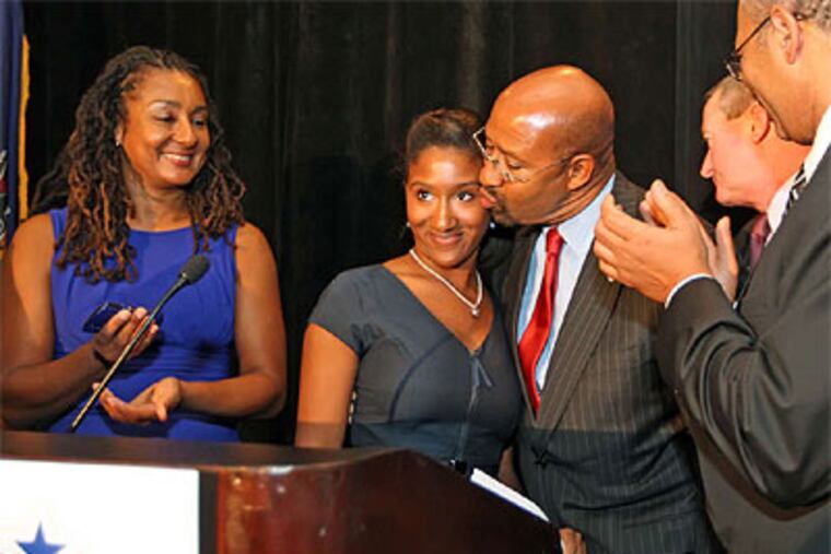 Philadelphia Mayor Michael Nutter celebrates after winning a second-term in the Tuesday, Nov. 8, 2011, General Election.