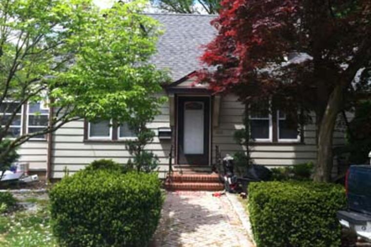 Police say Edward Todd II shot his wife and then committed suicide in this Hazel Avenue house. BILL REED / Staff