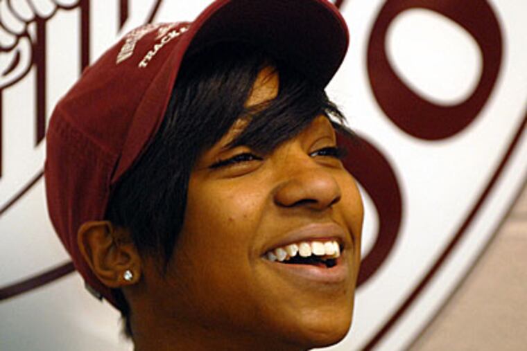 Abington HS sprinter Leah Nugent wears a VT cap after announcing her decision to attend Virginia Tech. (Tom Gralish/Staff Photographer)
